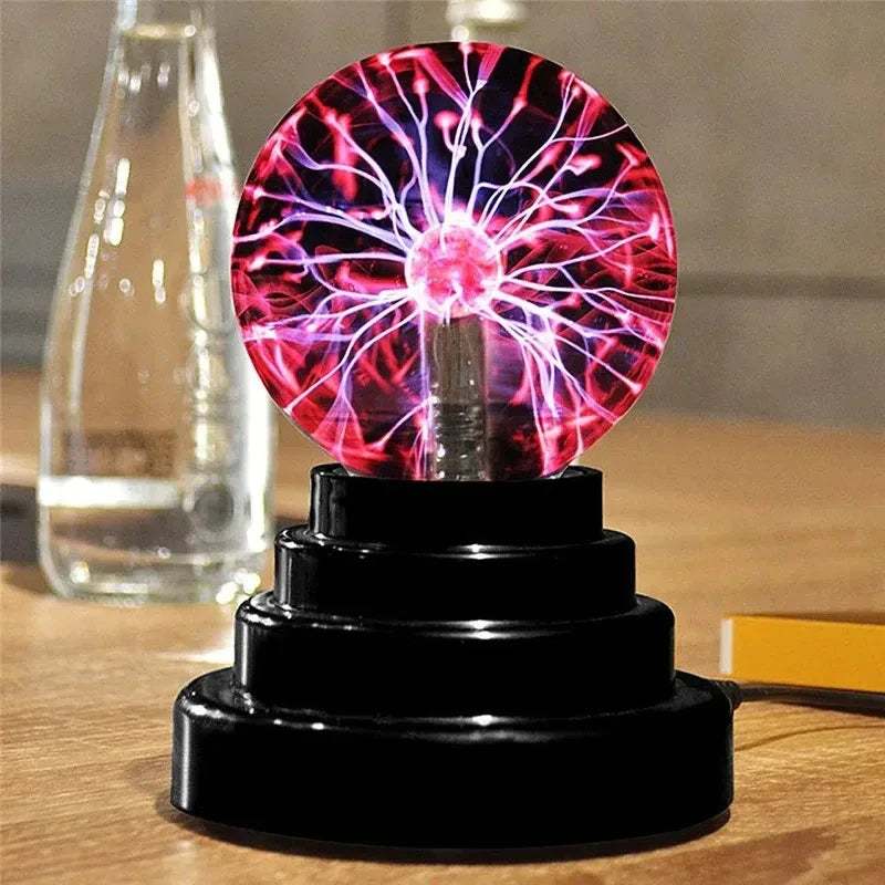 Plasma ball light on a wooden surface with a glass bottle in the background