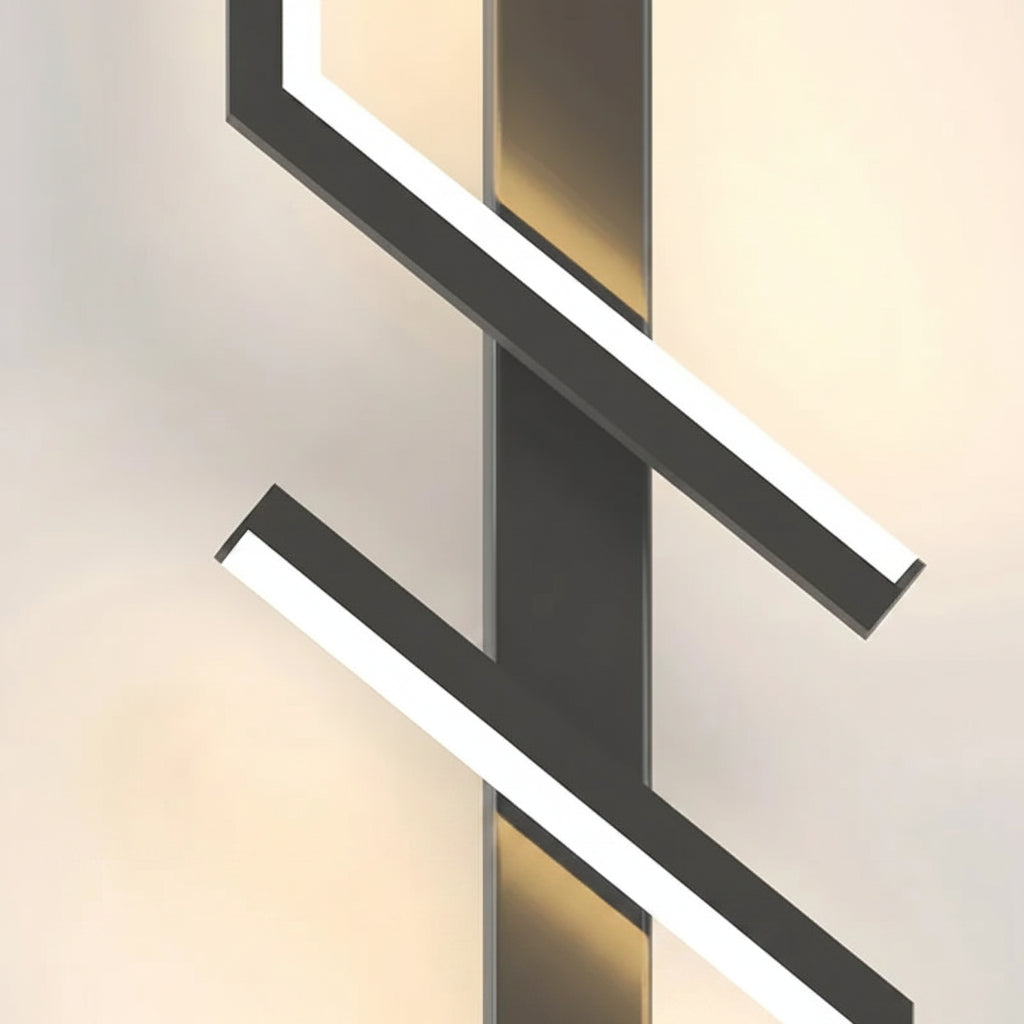 Modern wall-mounted light fixture with geometric design on a neutral background