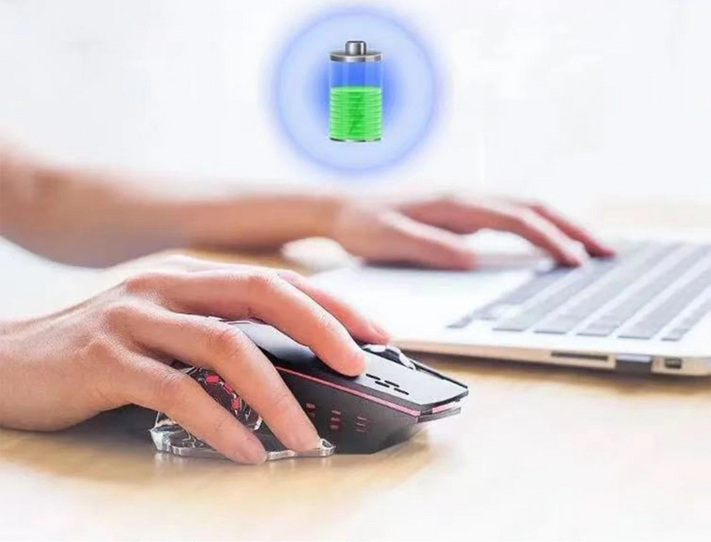 Person using a computer mouse with text about large capacity battery life.