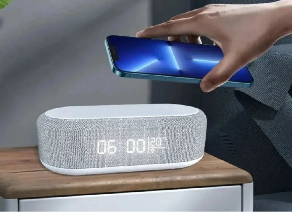 Wireless charging device on a table with a hand holding a smartphone, text 'Wireless Life' above.