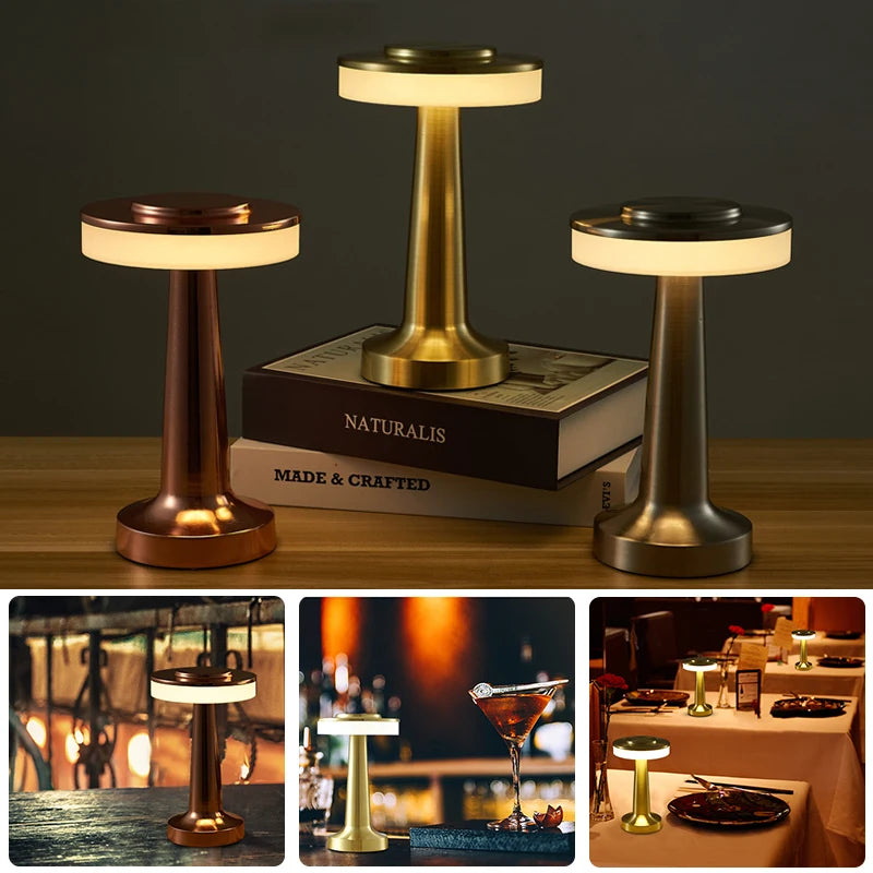 Three small round lamps on a wooden surface with 'Naturalis' branding.