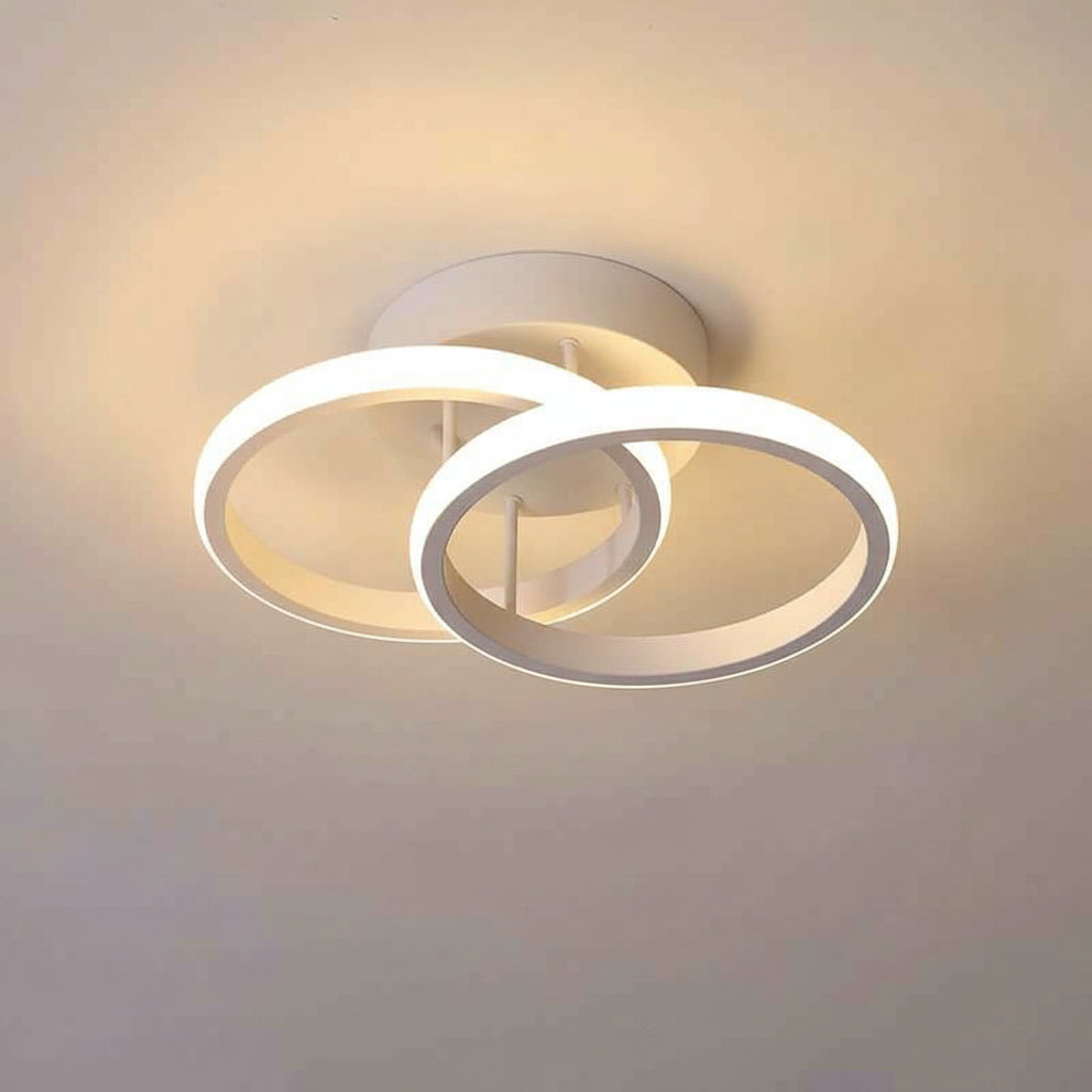 Ceiling light fixture with two circular designs and dimensions on a beige background