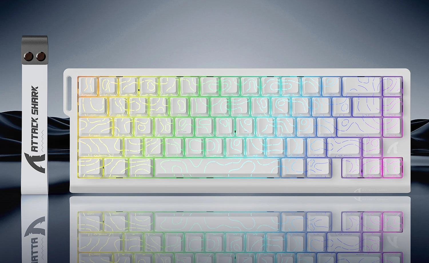 Attack Shark keyboard with white high wire design on a reflective surface
