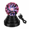 Plasma ball with USB cable on a white background