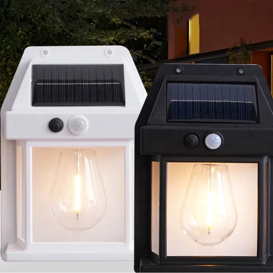 Solar body sensor wall lights in white and black on a neutral background