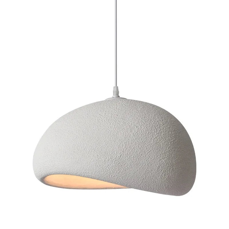 Textured gray pendant light on a white background
